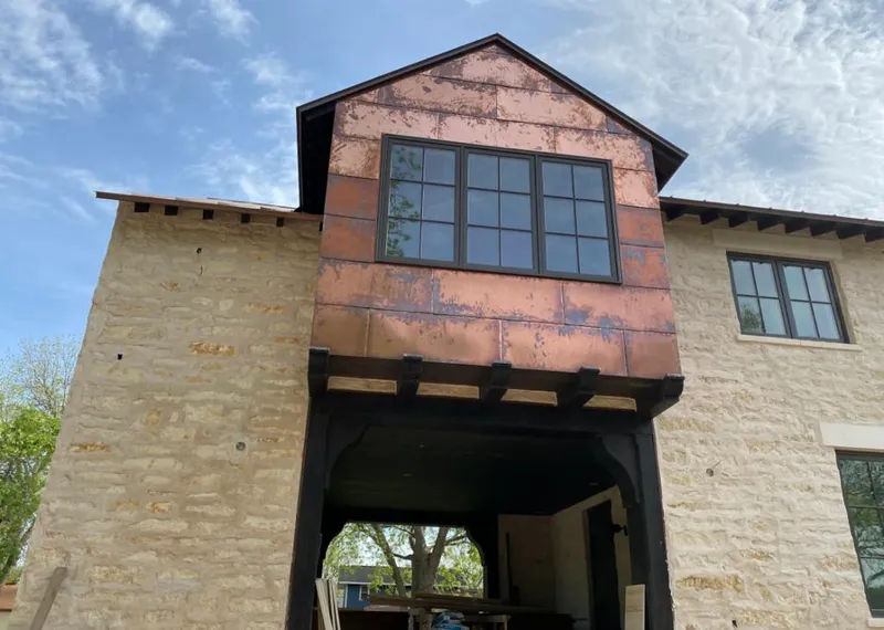 Copper metal panel facade on a stone building for Metal Roof Coating in San Elizario